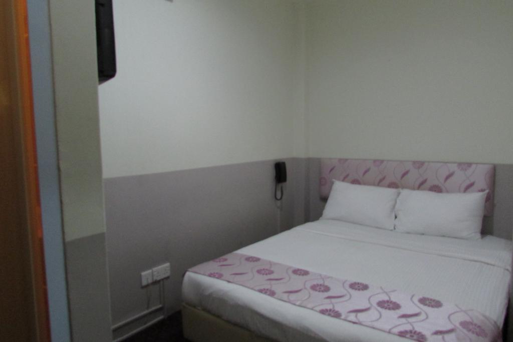 Meriton Hotel Singapur Habitación foto
