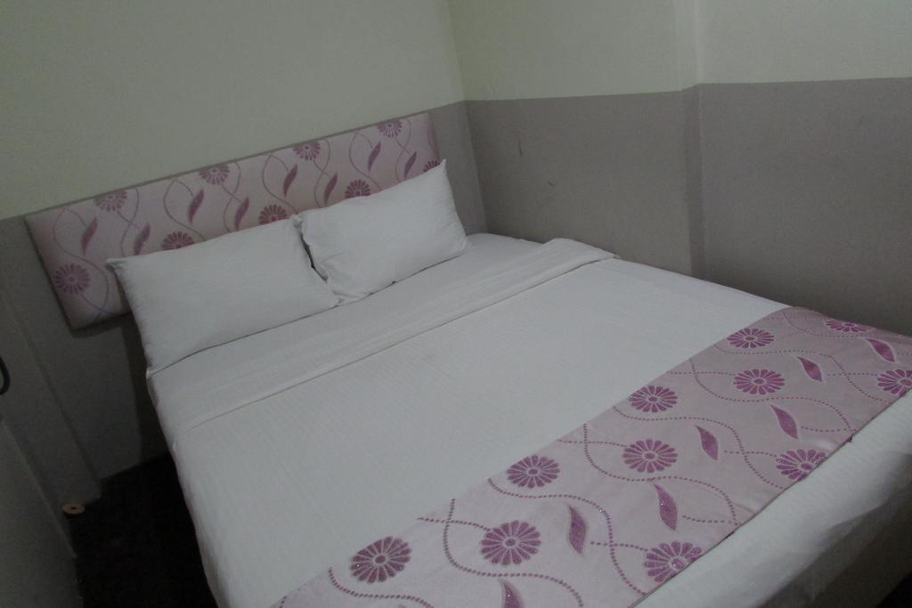 Meriton Hotel Singapur Habitación foto